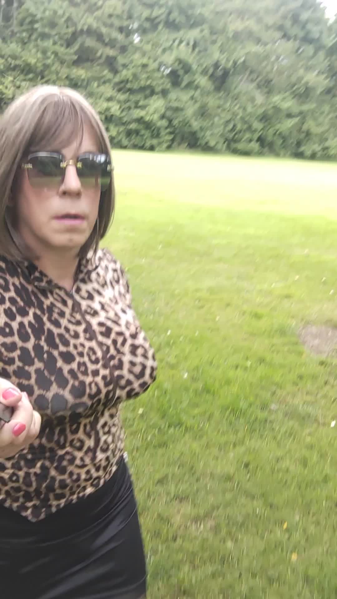 Crossdresser Holly out for a walk in the park